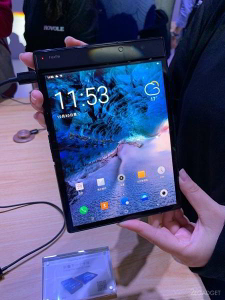 Выпущен первый в мире гибкий гаджет. Производитель не Samsung (7 фото + видео)